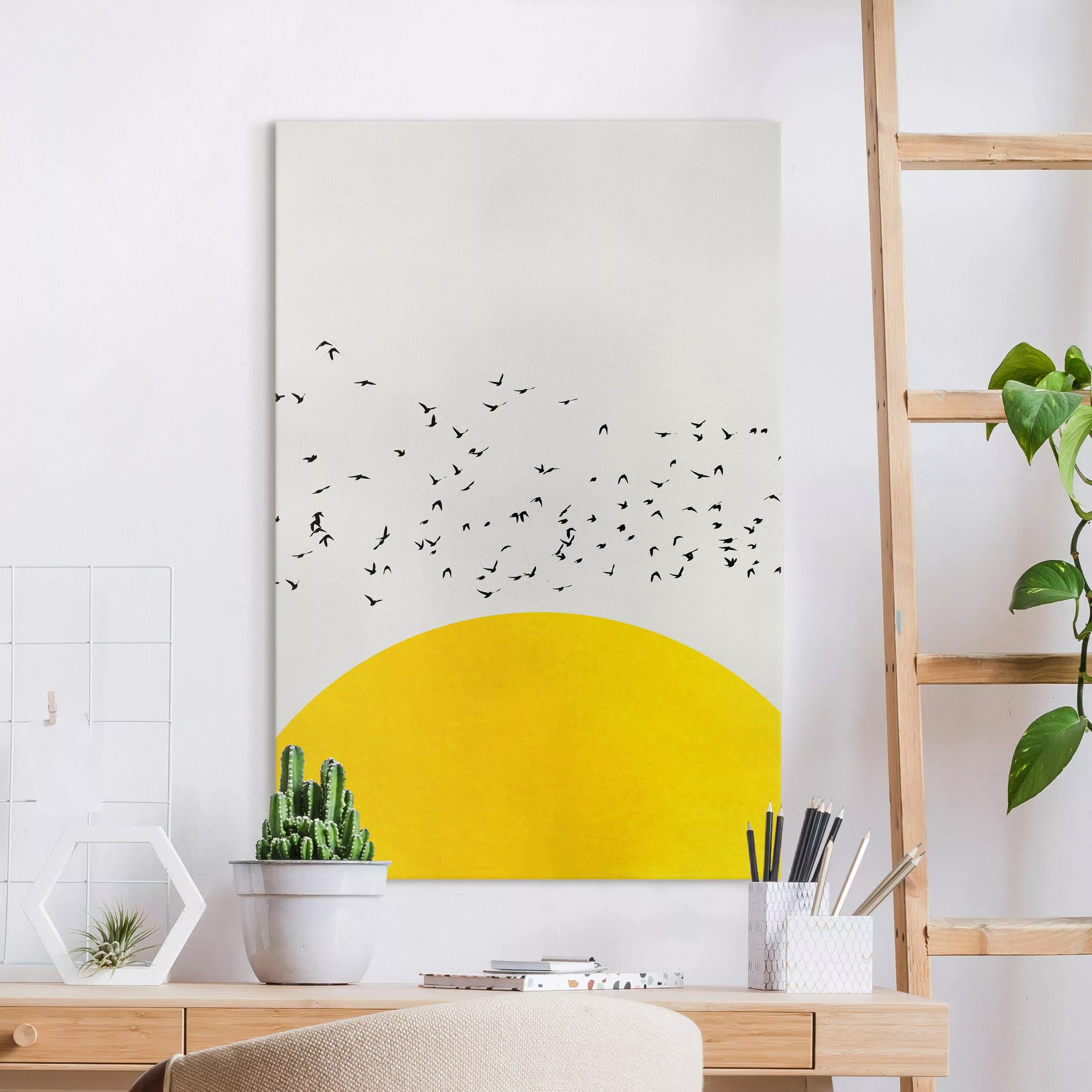 Leinwandbild Vogelschwarm vor gelber Sonne günstig online kaufen