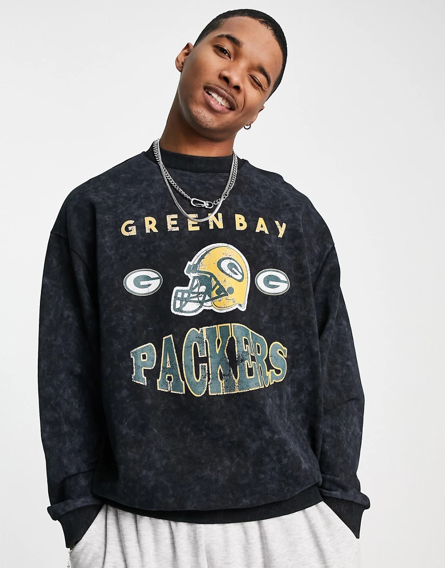 ASOS DESIGN – Oversize-Sweatshirt mit Green Bay Packers-Motiv in Schwarz günstig online kaufen