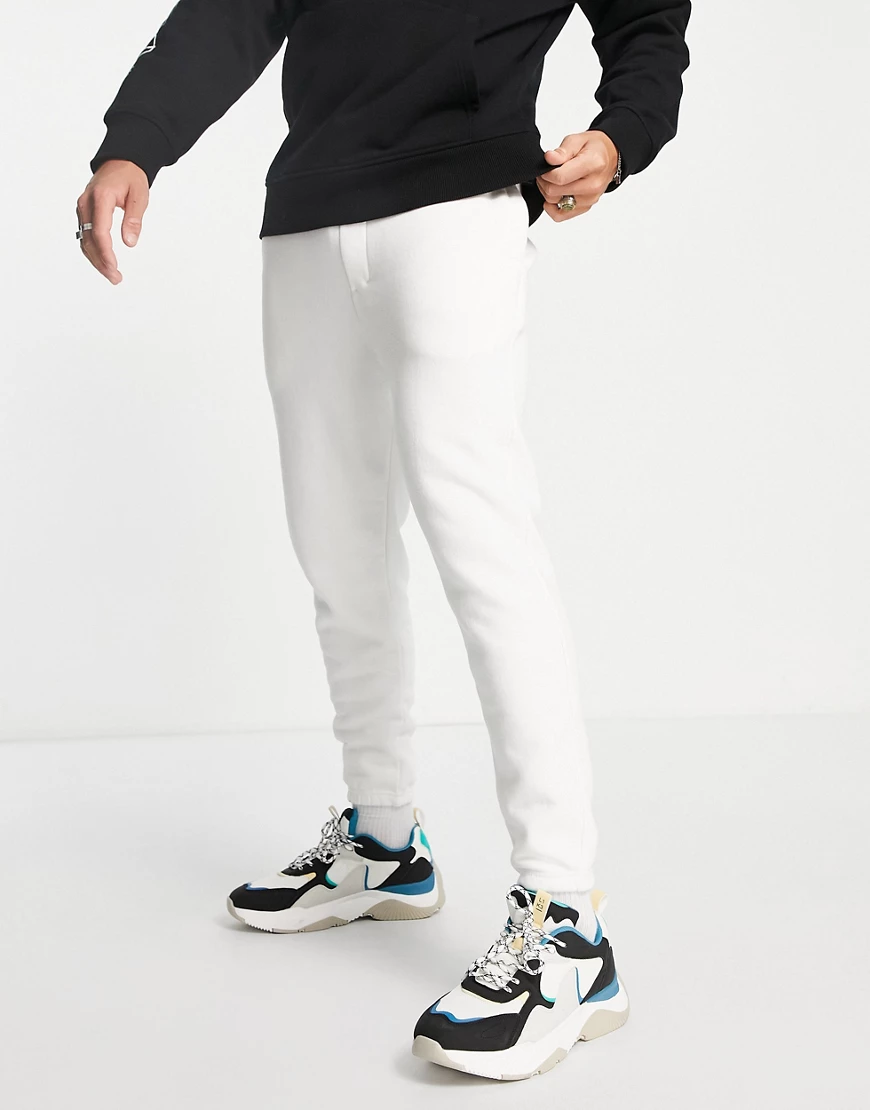 Pull&Bear – Locker geschnittene Jogginghose in Weiß günstig online kaufen