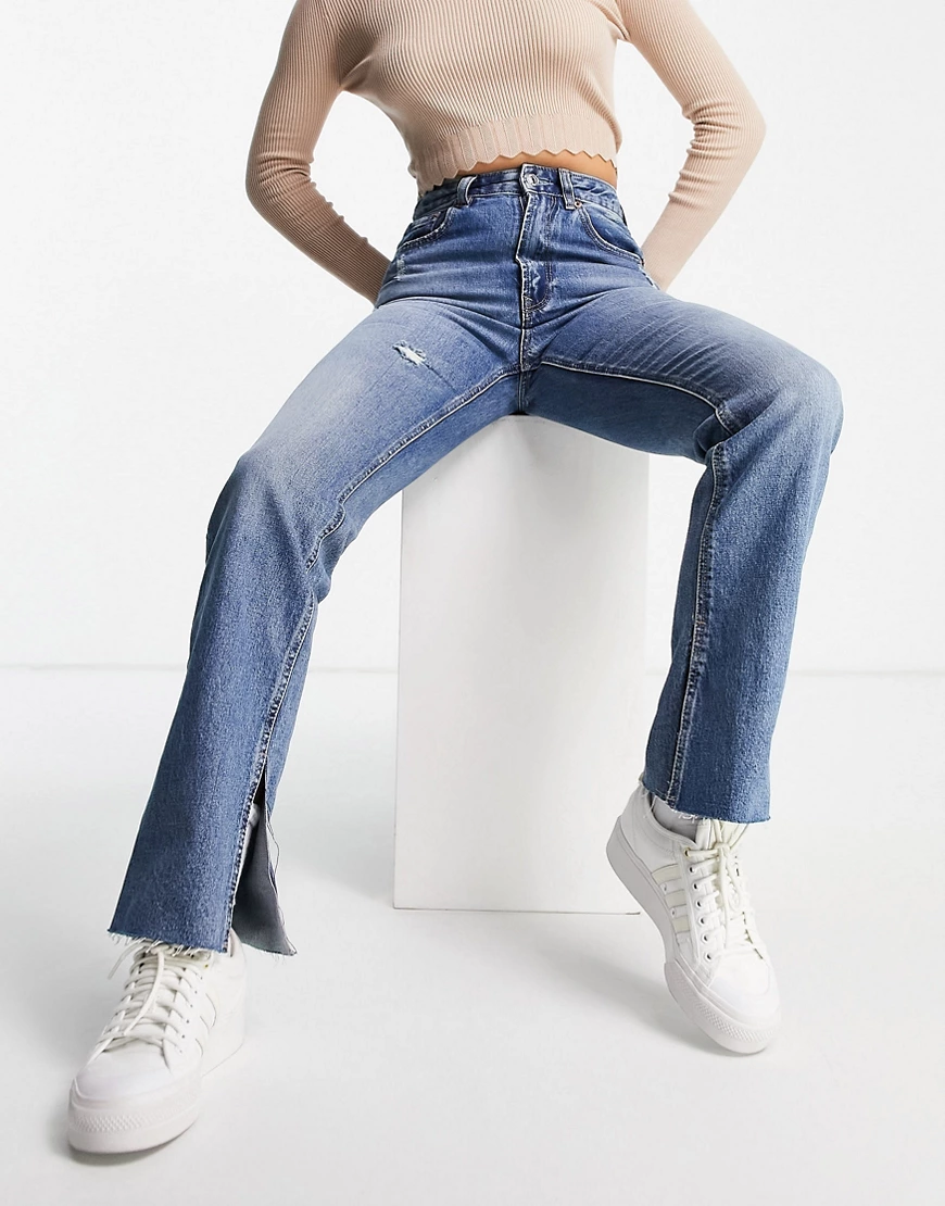 Stradivarius – Gerade geschnittene Jeans mit geschlitztem Saum in Vintage-W günstig online kaufen