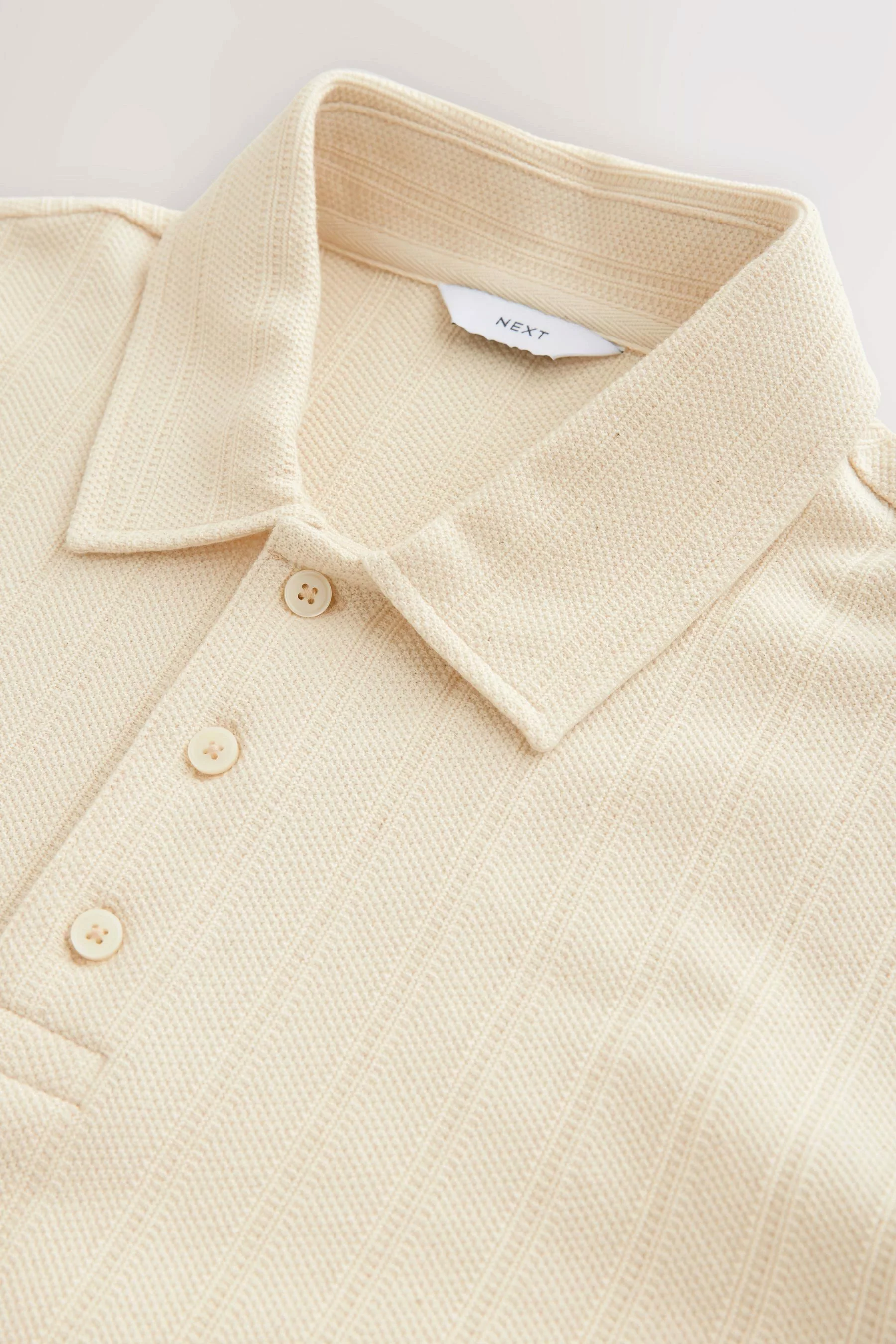 Next Poloshirt Lässiges Poloshirt mit vertikaler günstig online kaufen
