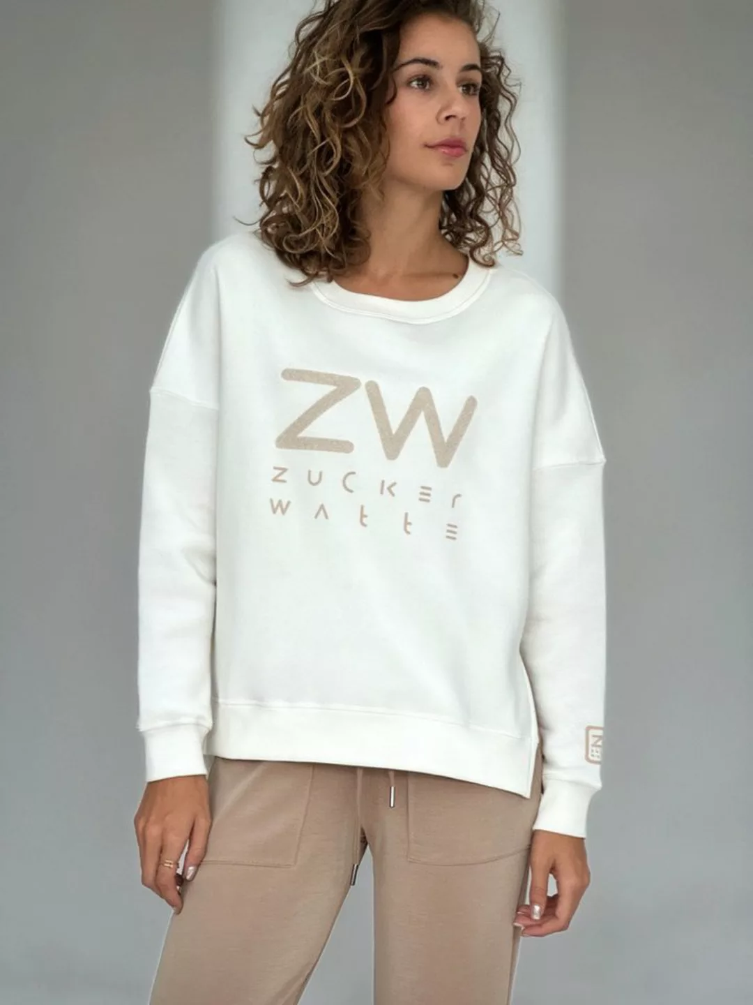 Zuckerwatte Sweatshirt mit Rundhalsausschnitt und modischer Frontapplikatio günstig online kaufen