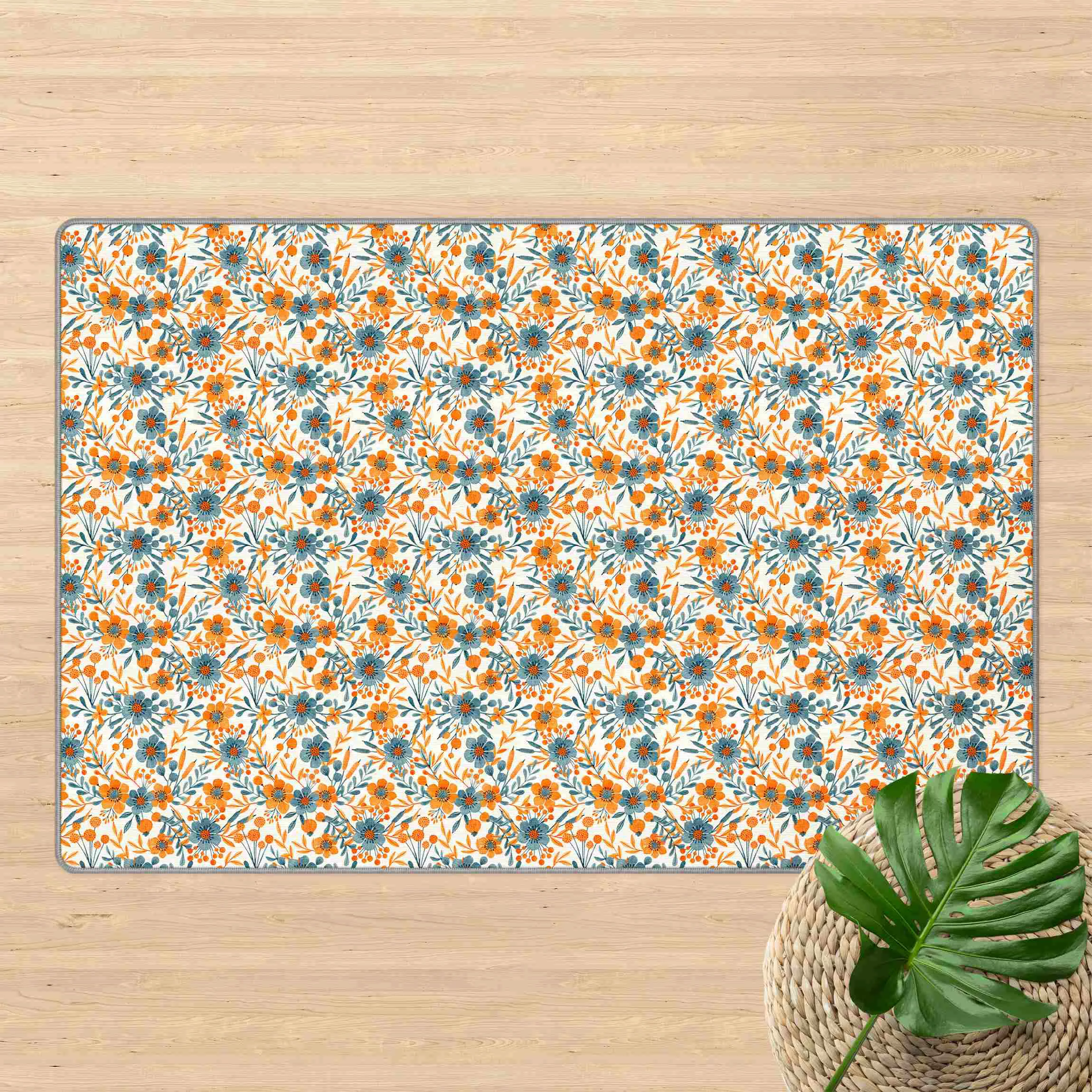 Teppich Orange Blaue Blüten auf Weiß günstig online kaufen