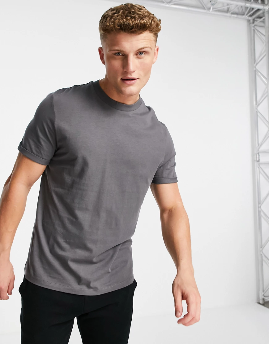 ASOS DESIGN – T-Shirt aus Bio-Material mit Rollärmeln in verwaschenem Schwa günstig online kaufen