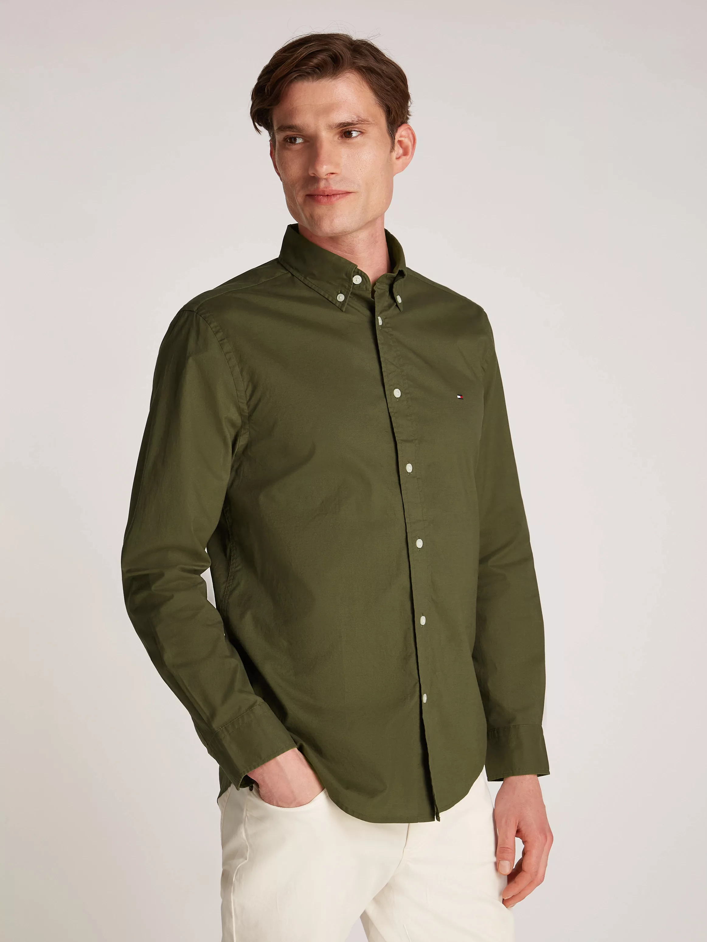 Tommy Hilfiger Businesshemd "FLEX POPLIN SOLID RF SHIRT 1", mit Logosticker günstig online kaufen