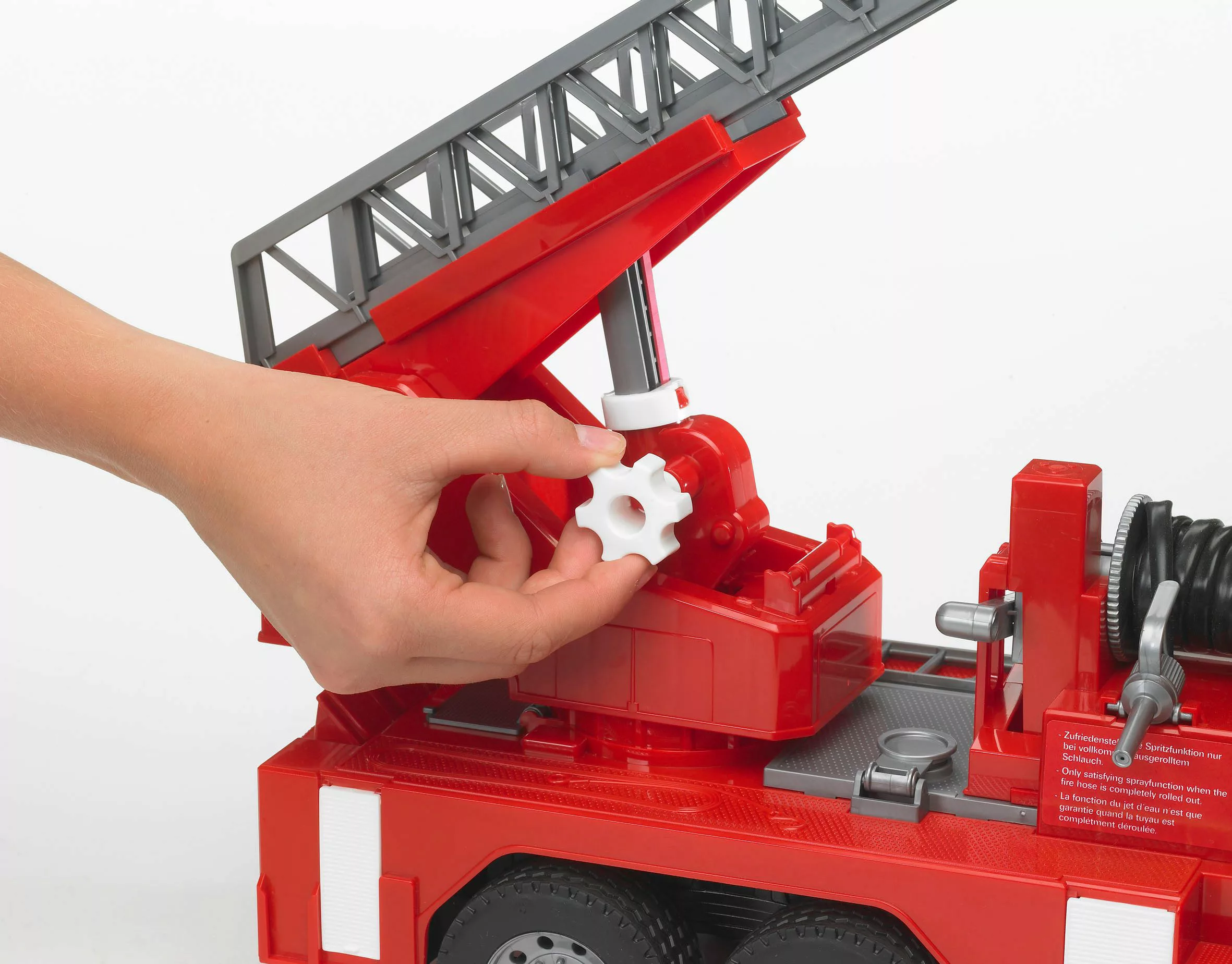Bruder® Spielzeug-Feuerwehr MAN Feuerwehr mit Drehleiter günstig online kaufen