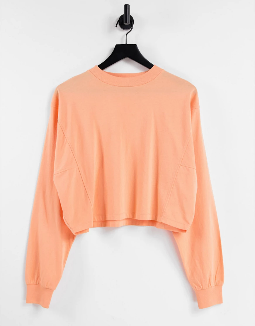 ASOS DESIGN – Langärmliges, kastiges Shirt in Pfirsich mit Ziernaht-Orange günstig online kaufen