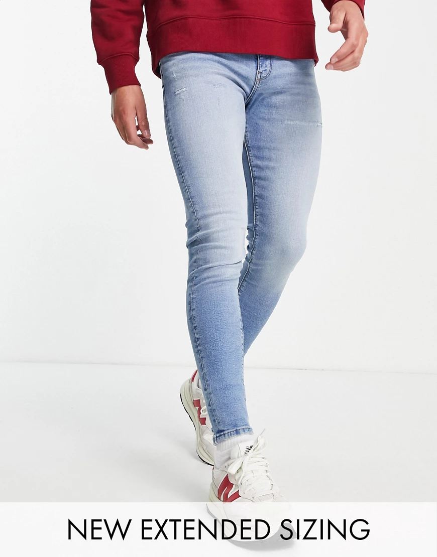 ASOS DESIGN – Hautenge Jeans in mittlerer Waschung mit Power-Stretch und Ab günstig online kaufen