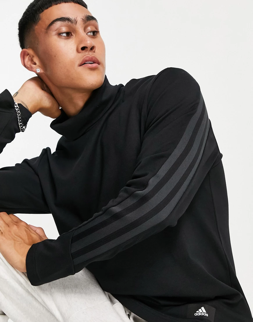 adidas – Langärmliges Oberteil in Schwarz mit Stehkragen günstig online kaufen