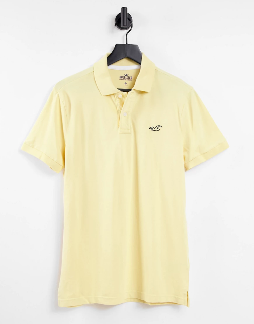 Hollister – Core – Pikee-Polohemd in Gelb mit Markenlogo günstig online kaufen
