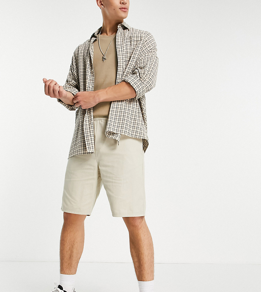 COLLUSION – Länger geschnittene Shorts in Beige-Neutral günstig online kaufen