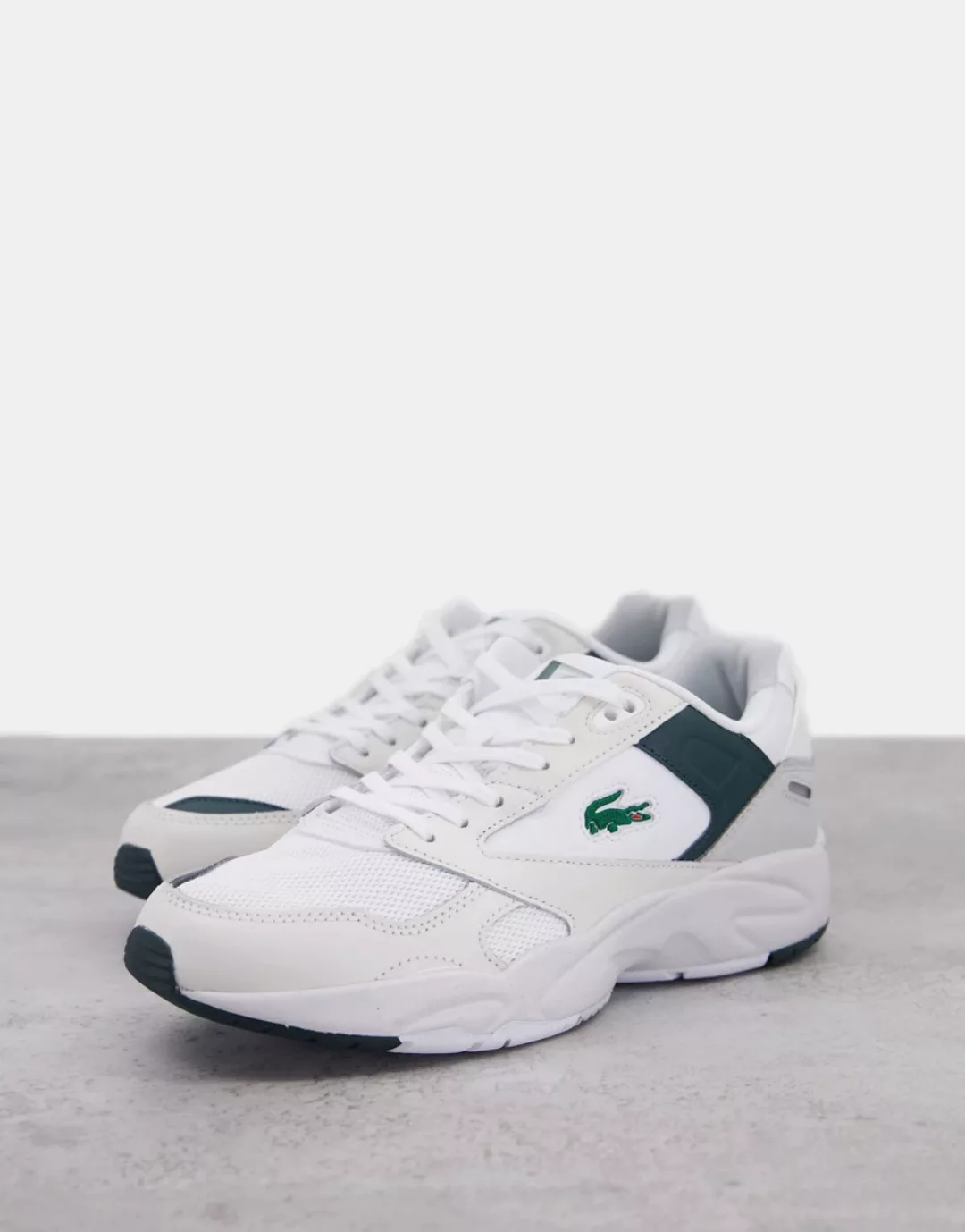 Lacoste – Storm 96 Lo – Sneaker in Weiß-Grün günstig online kaufen