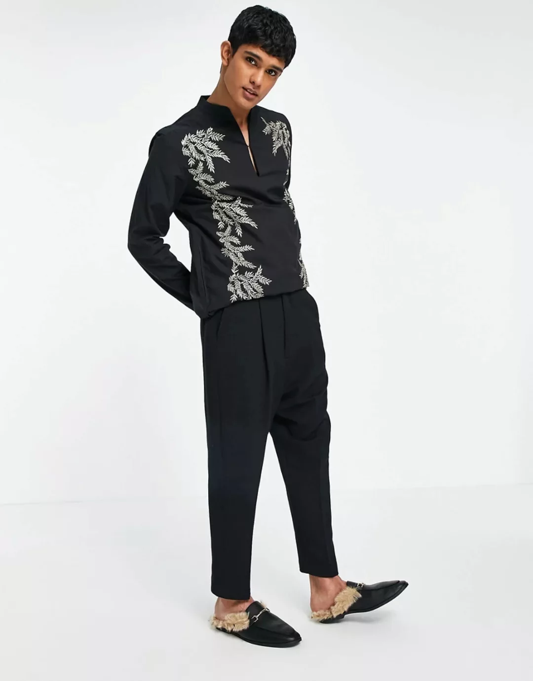 ASOS DESIGN – Enge, elegante Hose mit tiefem Schritt in Schwarz günstig online kaufen