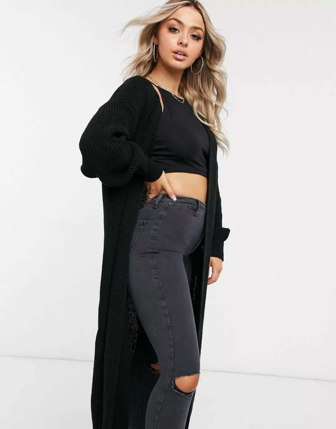 Femme Luxe – Lang geschnittene Strickjacke in Schwarz günstig online kaufen
