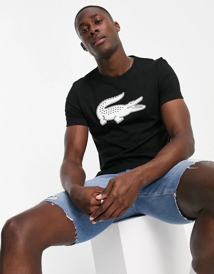 Lacoste – T-Shirt in Schwarz mit Krokodil-Logo günstig online kaufen
