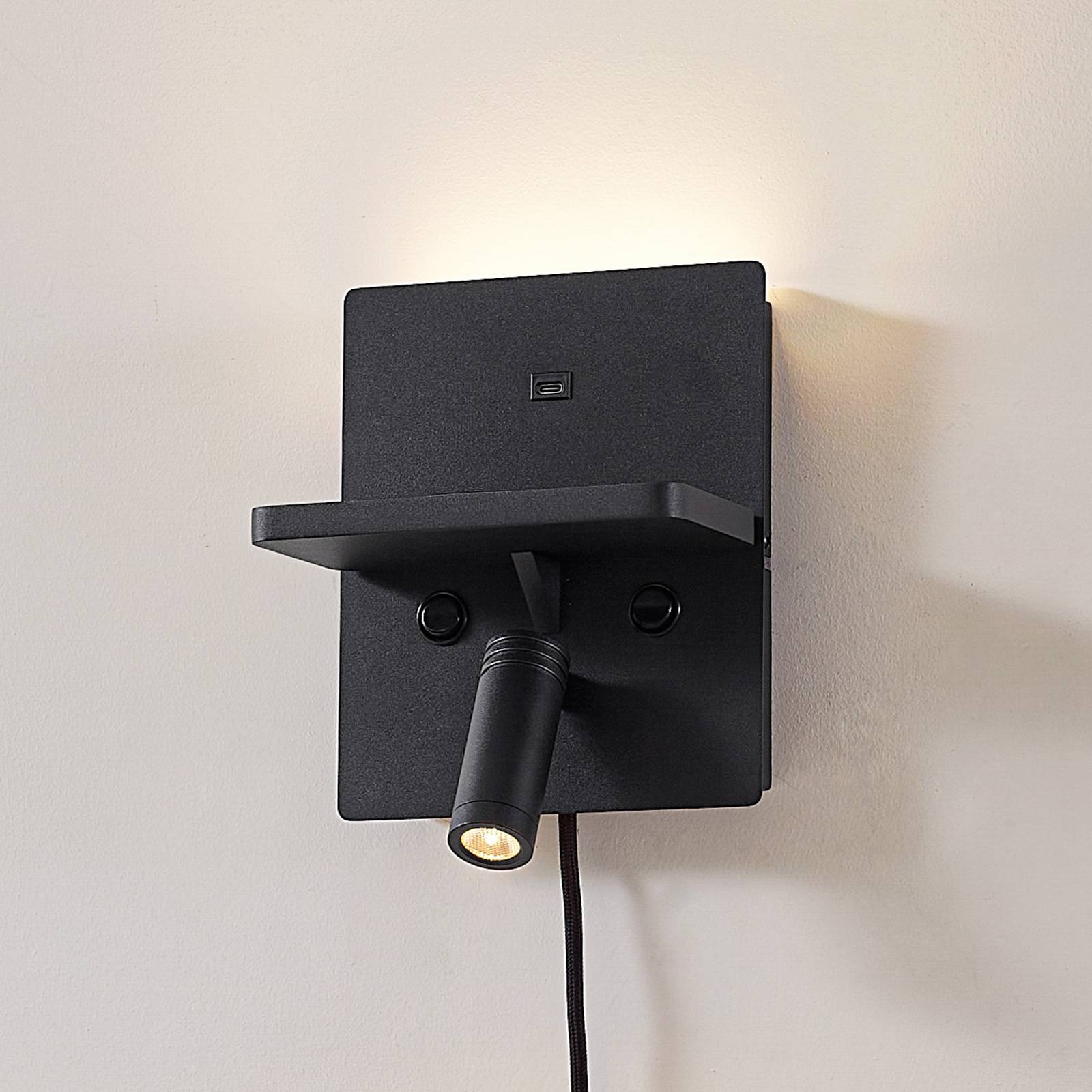 Lindby LED-Wandlampe Auden, schwarz, Stecker, Ladestation günstig online kaufen