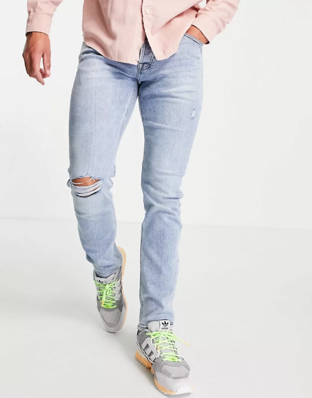 Jack & Jones Intelligence – Glenn – Schmale Jeans mit Knierissen in hellbla günstig online kaufen