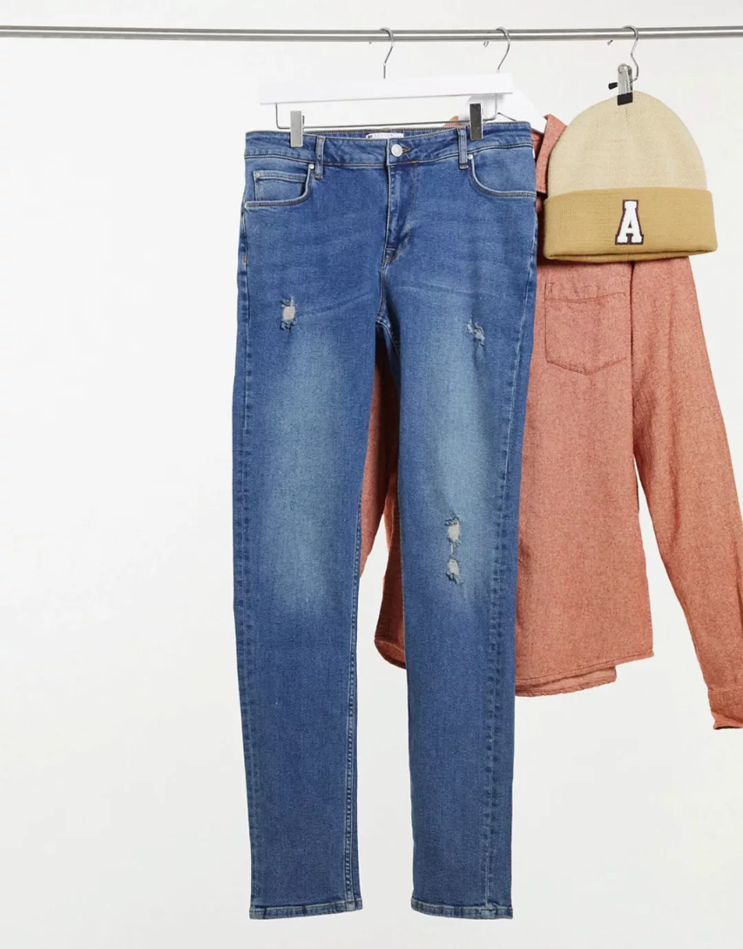 ASOS DESIGN – Enge Jeans im Used-Look in mittelblauer Waschung günstig online kaufen