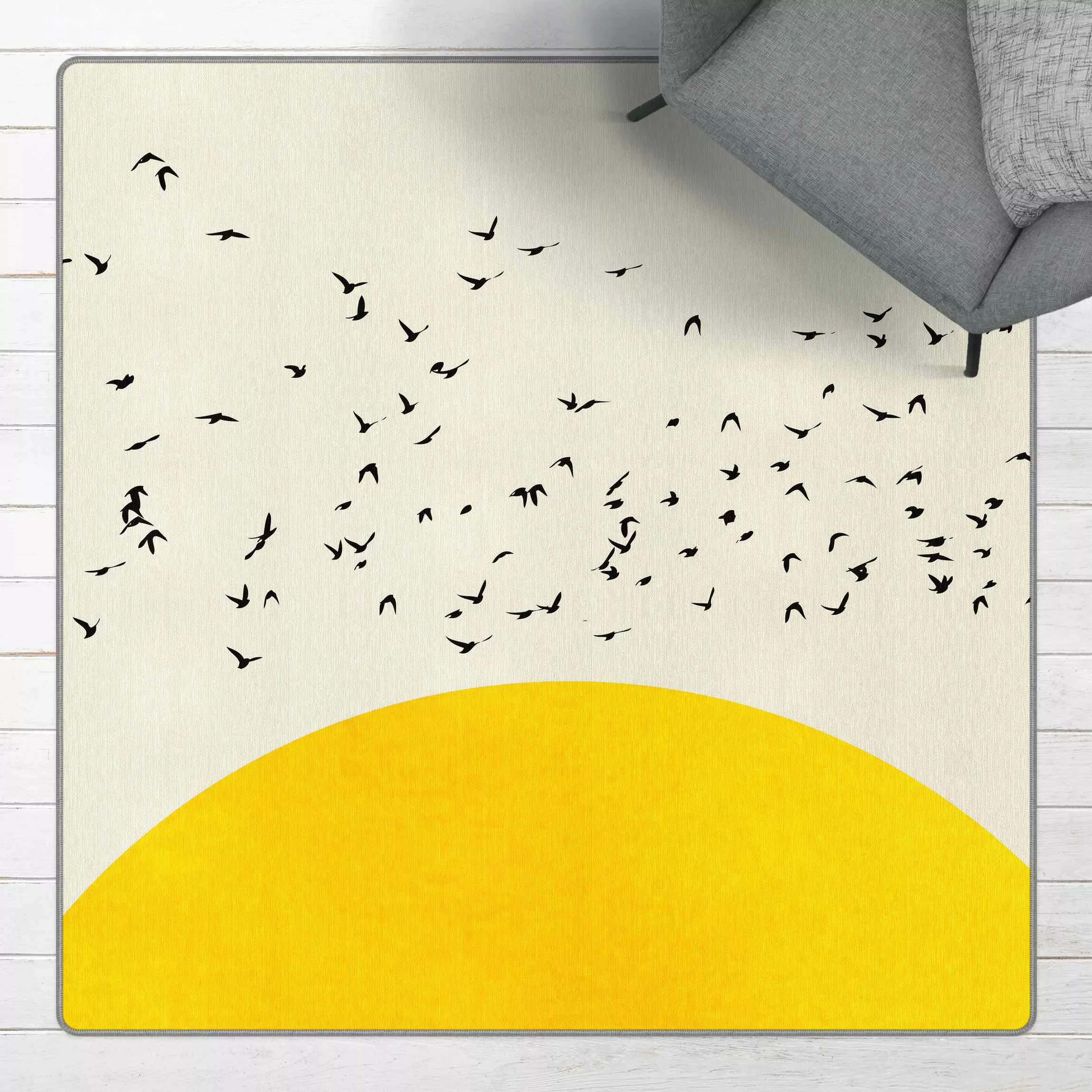 Teppich Vogelschwarm vor gelber Sonne günstig online kaufen