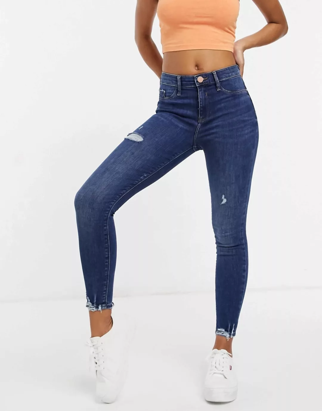 River Island – Molly – Jeans mit engem Schnitt und unbehandeltem Saum in Au günstig online kaufen