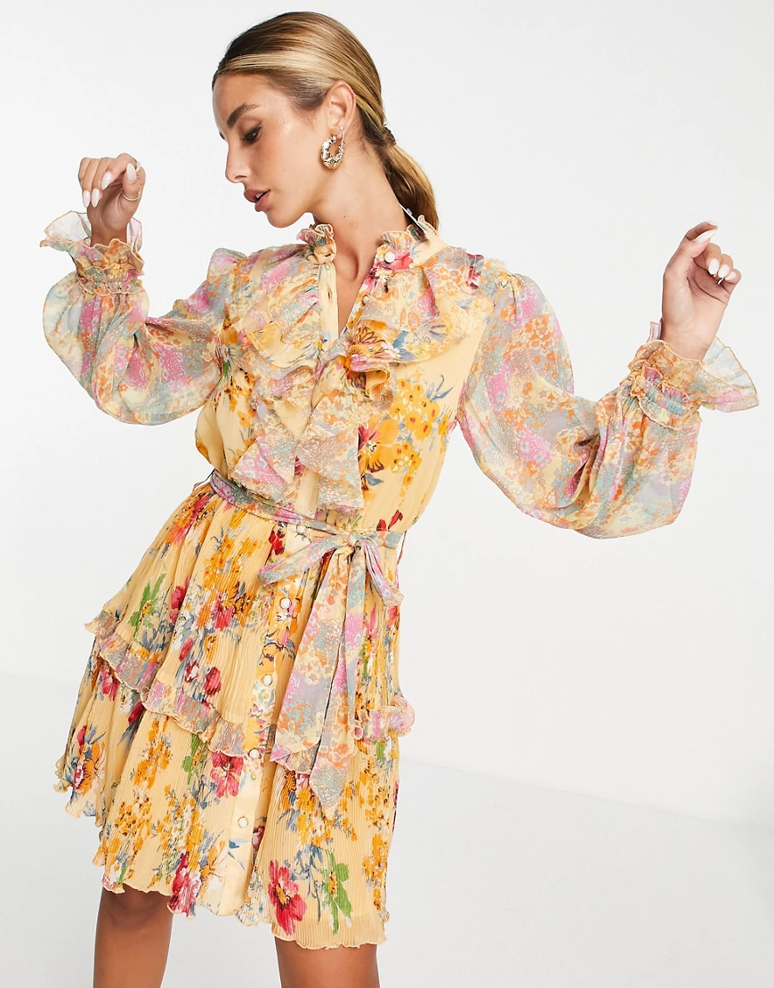 River Island – Langärmliges Minikleid in Gelb mit Rüschen und Blumenmuster- günstig online kaufen