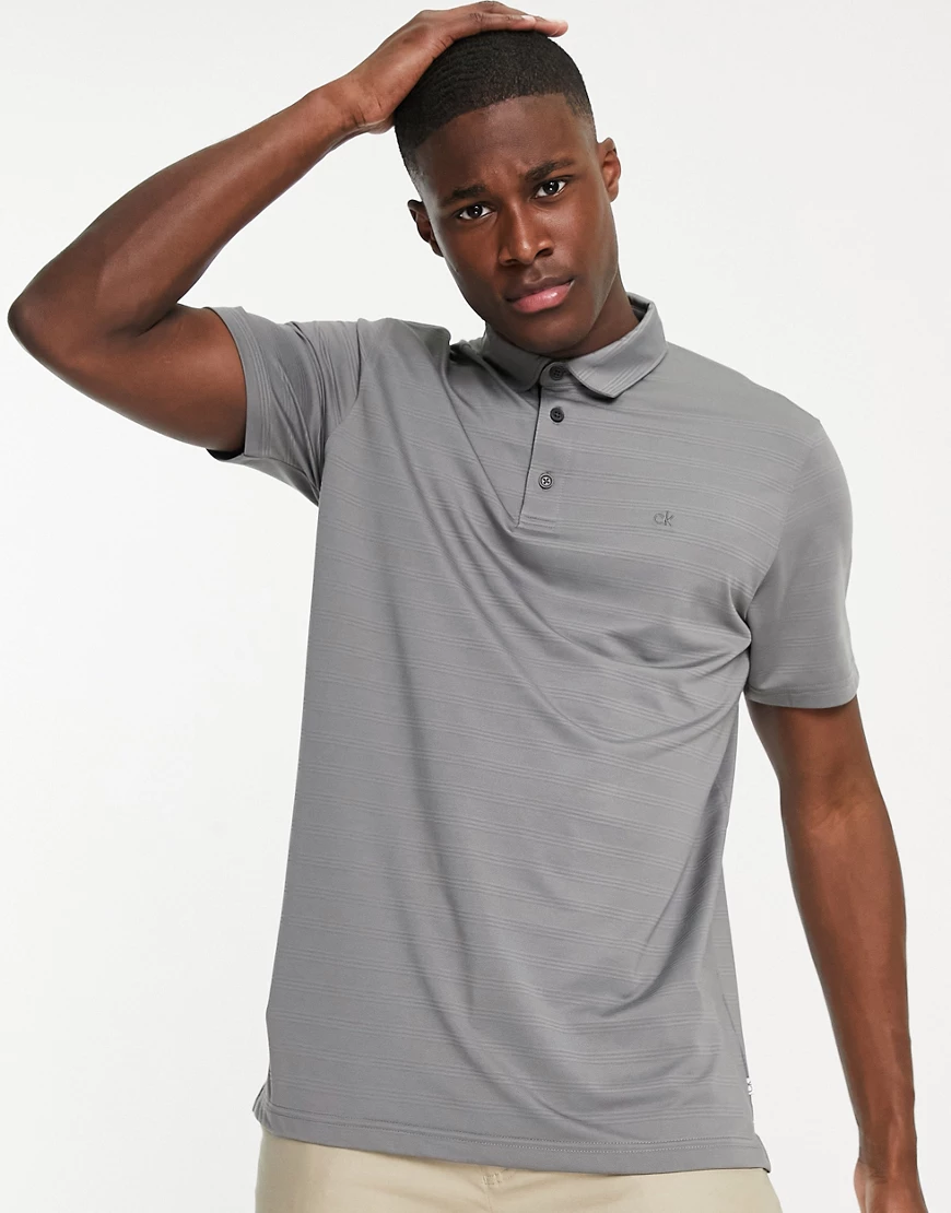 Calvin Klein – Poloshirt mit Dreifach-Jacquardstreifen in Grau günstig online kaufen