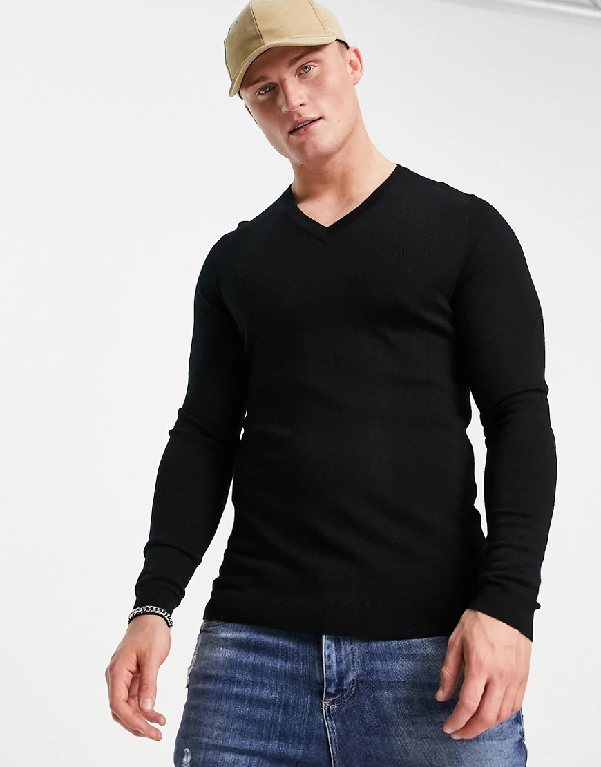 ASOS DESIGN – Muskel-Pullover aus Merinowolle in Schwarz mit V-Ausschnitt günstig online kaufen