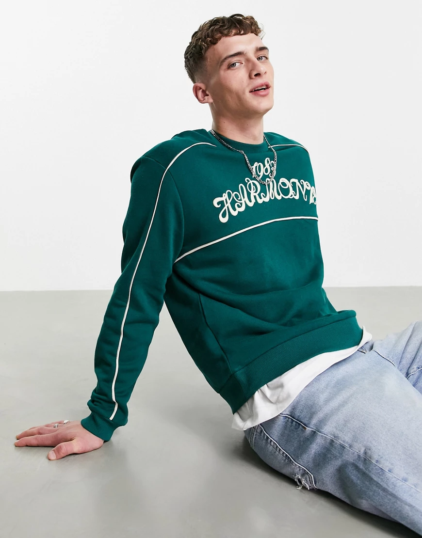 ASOS DESIGN – Oversize-Sweatshirt in Grün mit Paspelierung und Textstickere günstig online kaufen