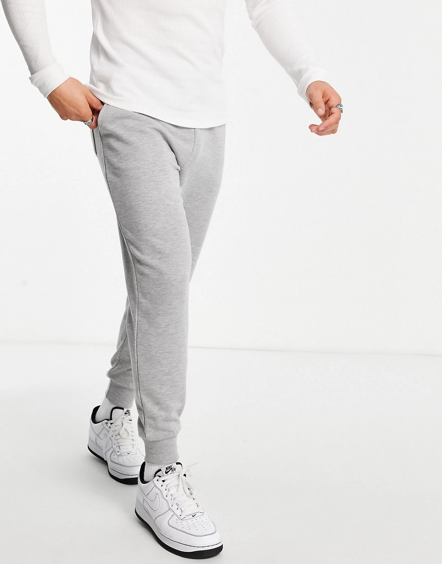 ASOS DESIGN – Enge Jogginghose in Kalkgrau günstig online kaufen