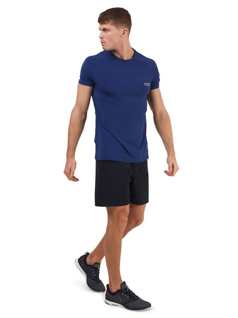 TCA T-Shirt TCA Herren Stamina Laufshirt mit Reißverschlusstasche - Dunkelb günstig online kaufen