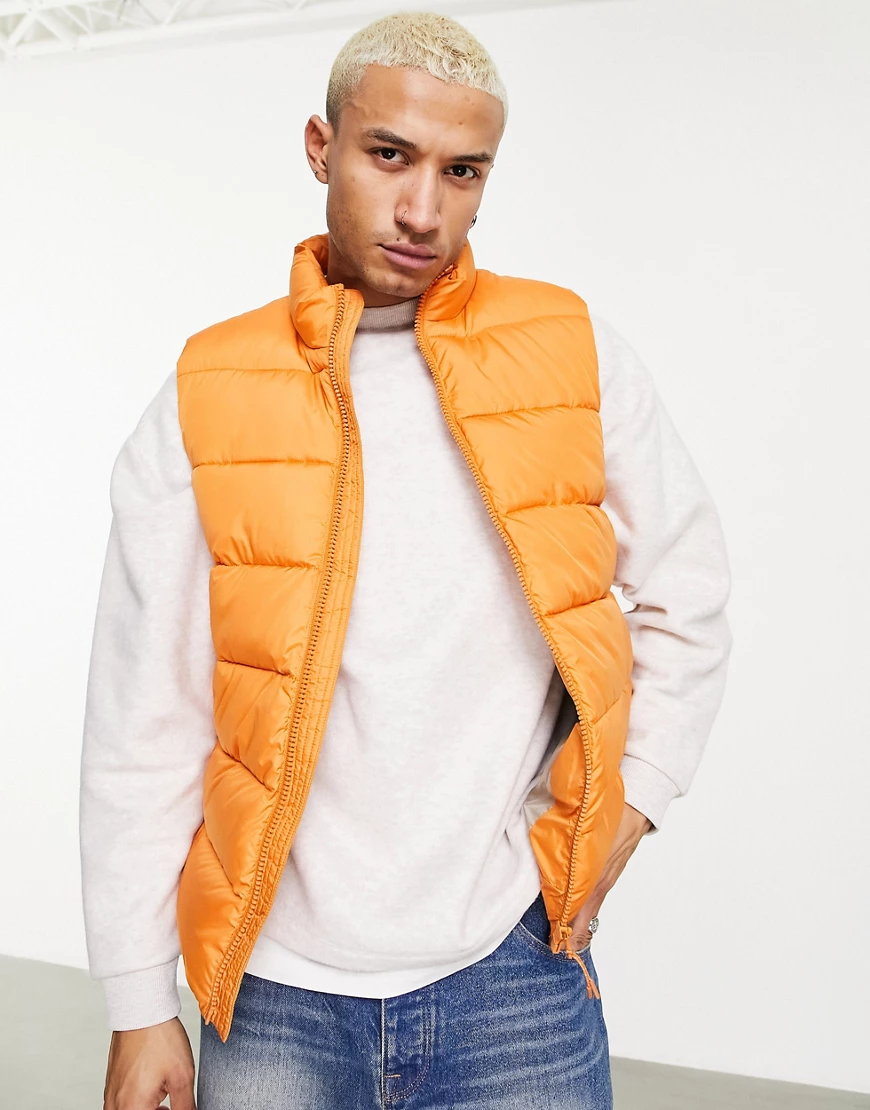 ASOS DESIGN – Steppweste in Orange mit kontrastierendem Innenfutter günstig online kaufen