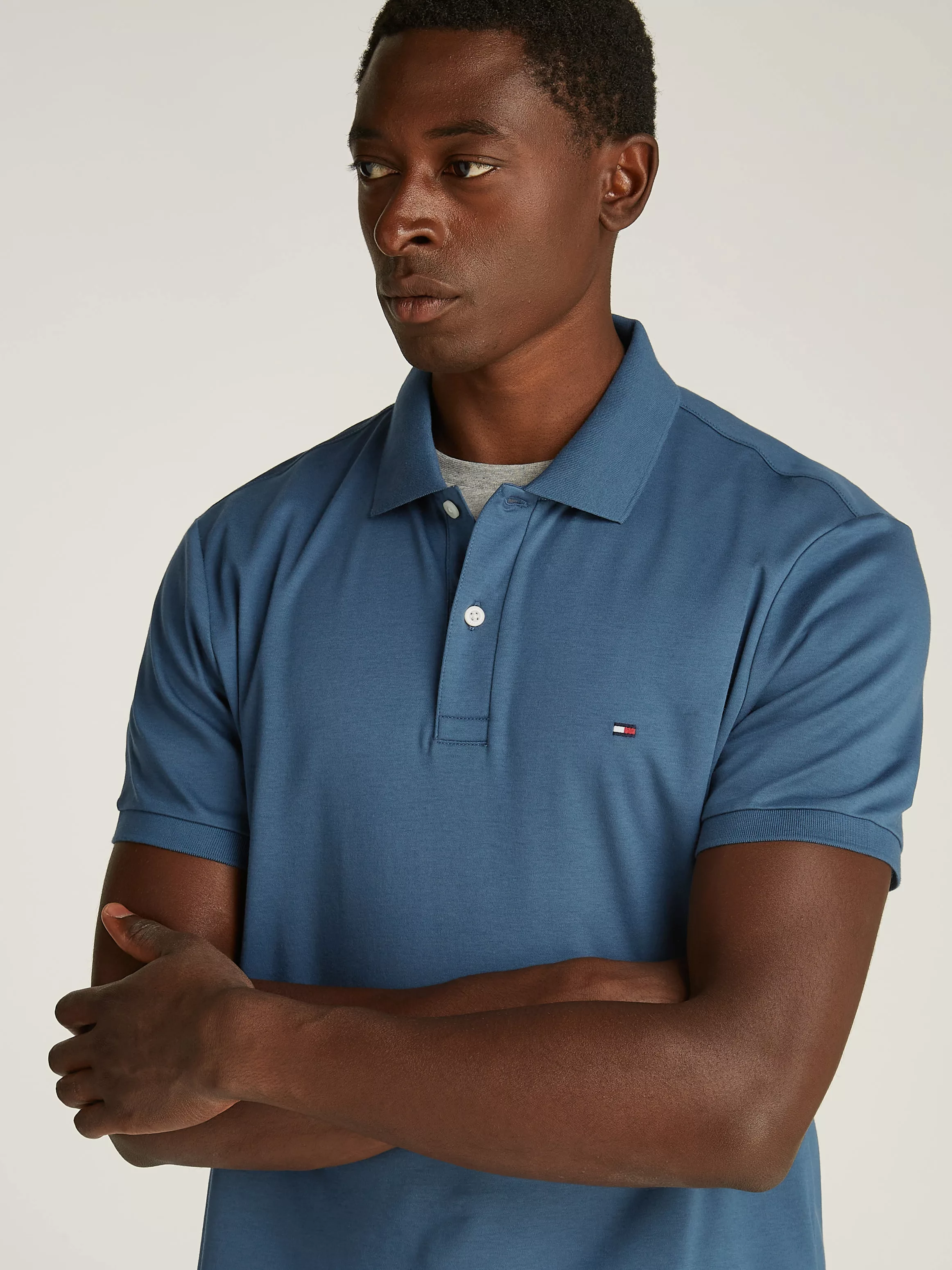 Tommy Hilfiger Poloshirt "LIQUID COTTON REG SEASONAL POLO", mit Logosticker günstig online kaufen