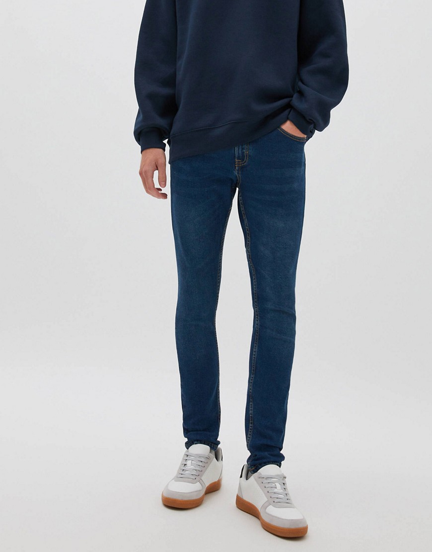 Pull&Bear – Superenge Jeans in Dunkelblau-Marineblau günstig online kaufen