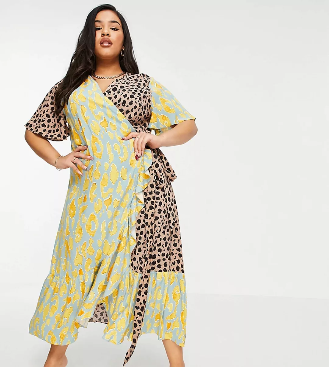 Never Fully Dressed Plus – Midaxi-Kleid im Wickeldesign mit Rüschensaum und günstig online kaufen