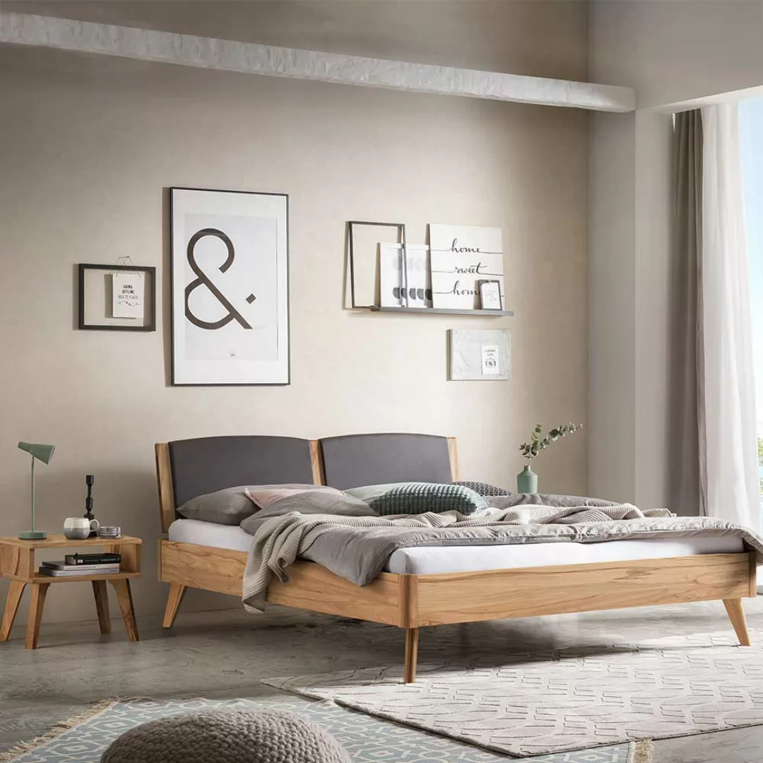 Modernes Massivholz Bett in Wildbuchefarben geölt gepolstertem Kopfteil günstig online kaufen