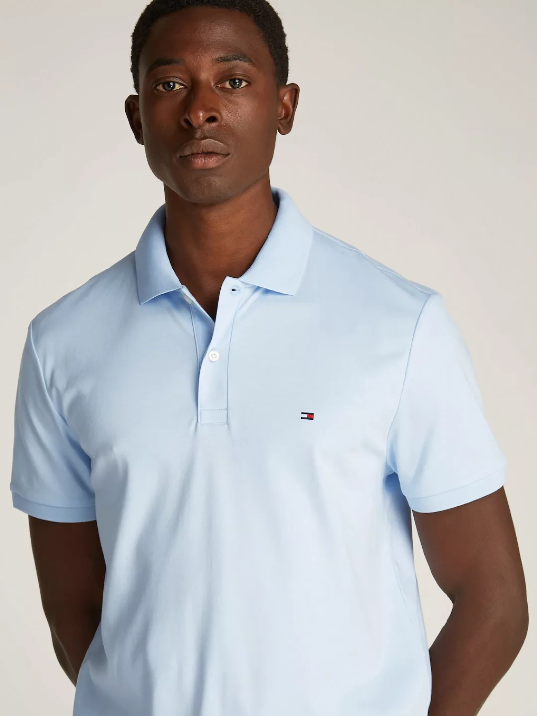 Tommy Hilfiger Poloshirt "LIQUID COTTON REG SEASONAL POLO", mit Logosticker günstig online kaufen