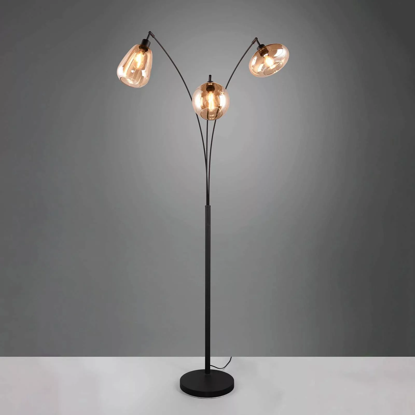 Stehleuchte Lumina, 3-flammig, schwarz/amber, Glas günstig online kaufen