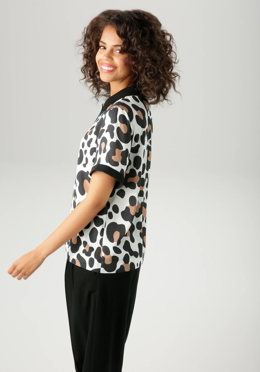 Aniston CASUAL Kurzarmbluse, im extravaganten Animal-Print- jedes Teil ein günstig online kaufen