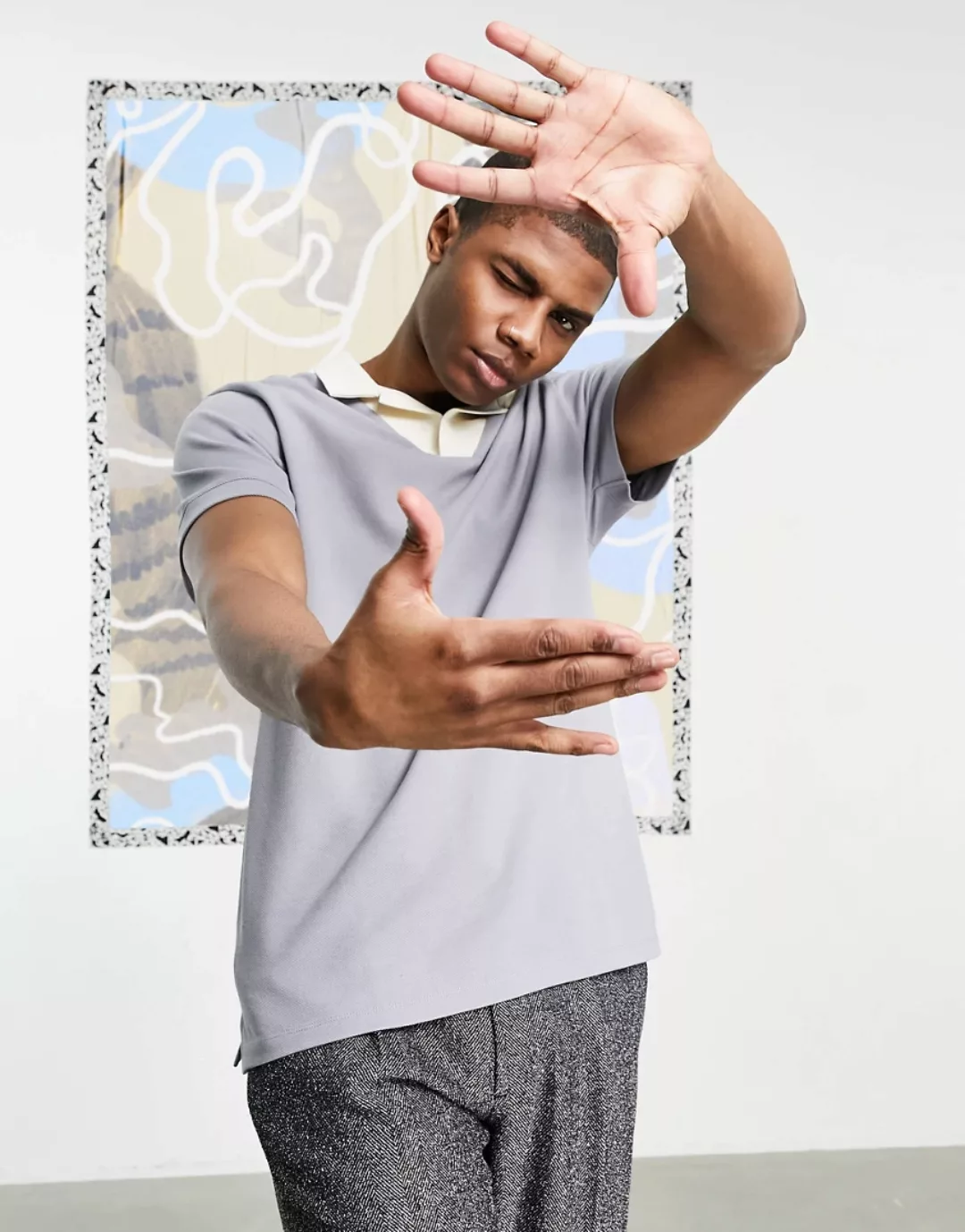 ASOS DESIGN – Schickes Pikee-Polohemd in Grau mit farblich abgesetztem Reve günstig online kaufen