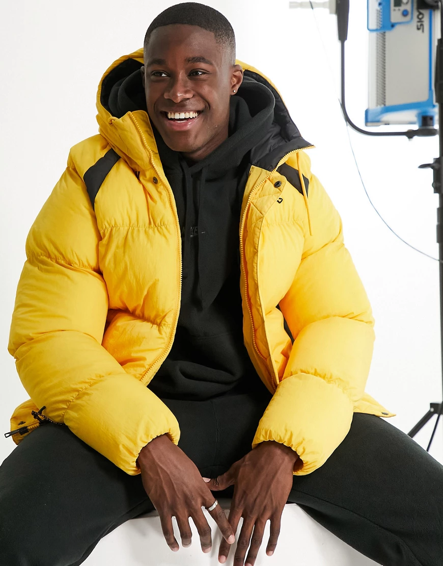 Nike – Jordan Essentials – Pufferjacke in Gelb mit synthetischer Füllung günstig online kaufen