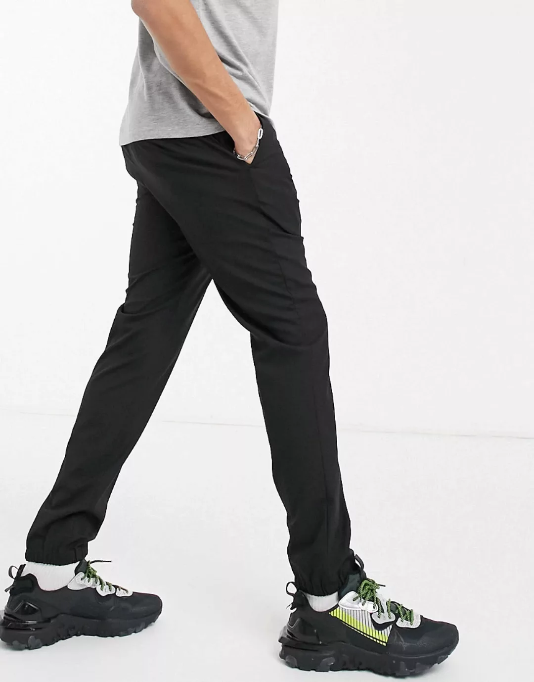 ASOS DESIGN – Elegante, enge Hose in Schwarz mit elastischem Taillenbund günstig online kaufen