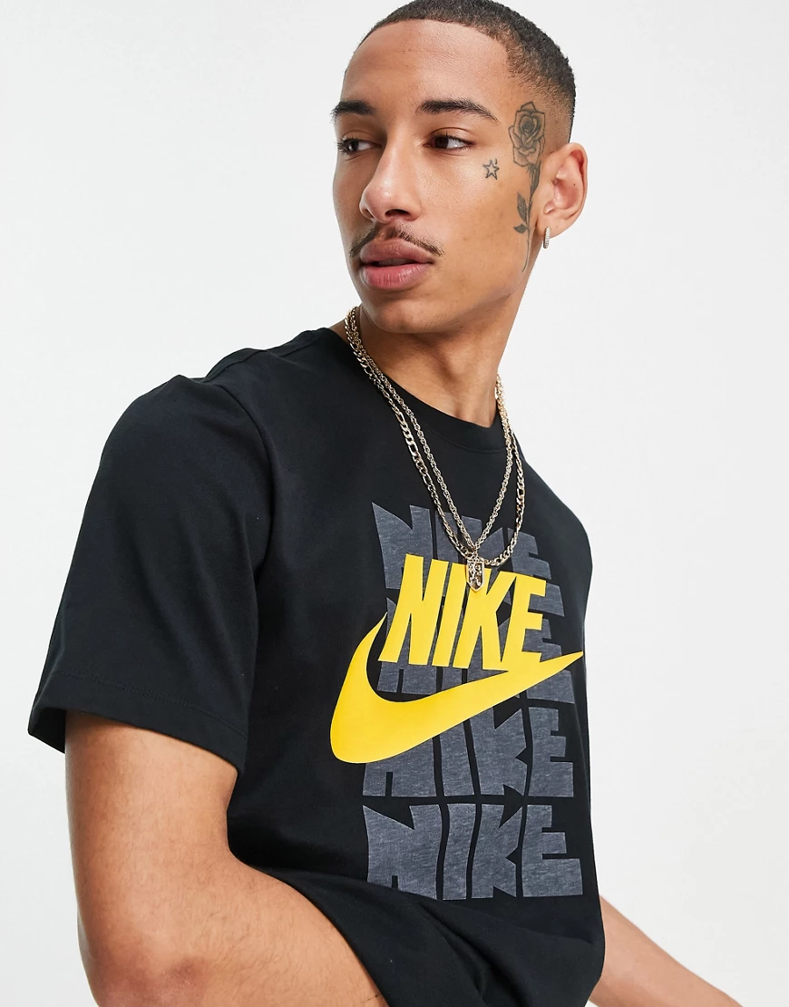 Nike – T-Shirt in Schwarz mit Vintage-College-Print günstig online kaufen
