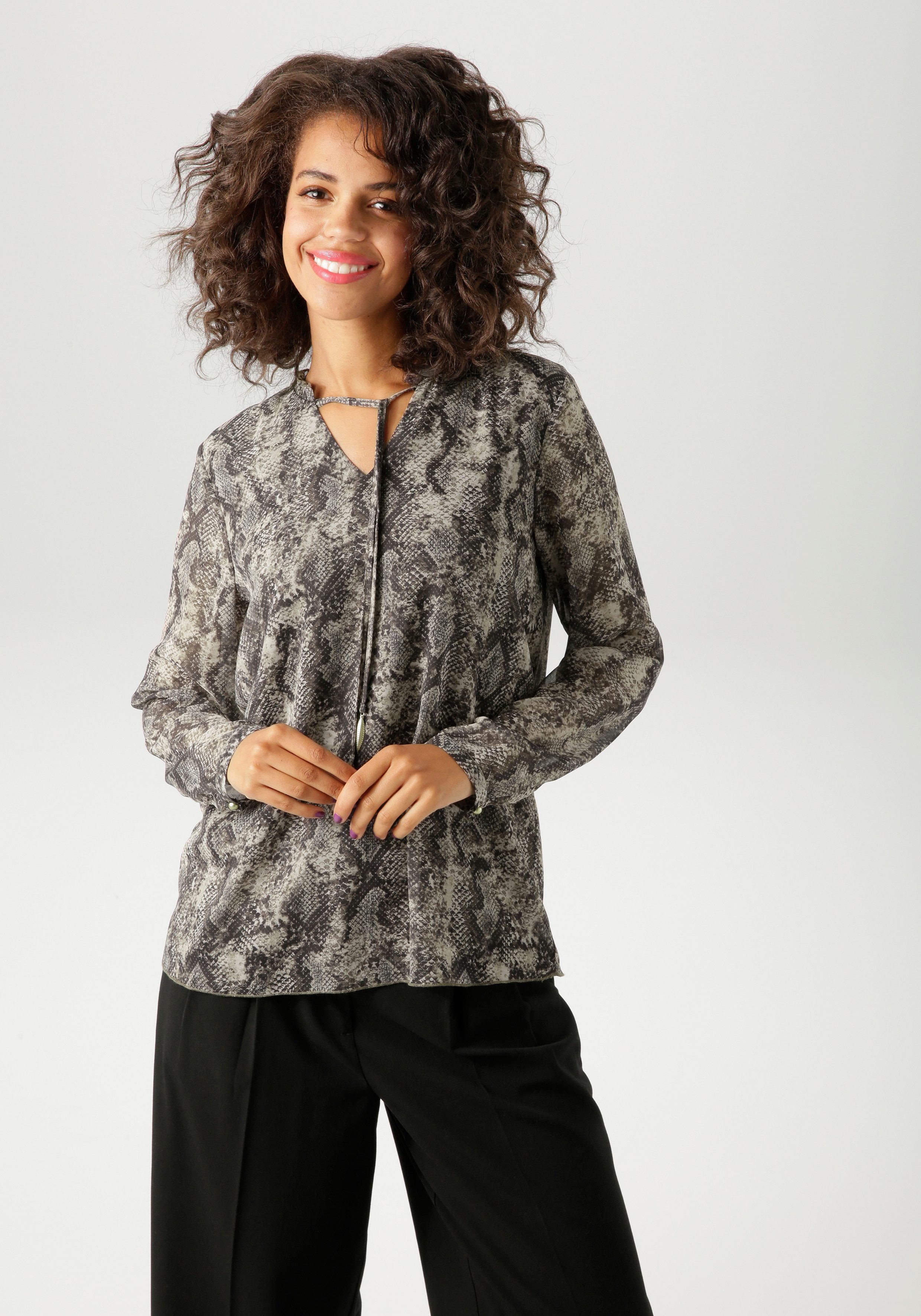 Aniston CASUAL Schlupfbluse mit trendigem Schlangendruck günstig online kaufen