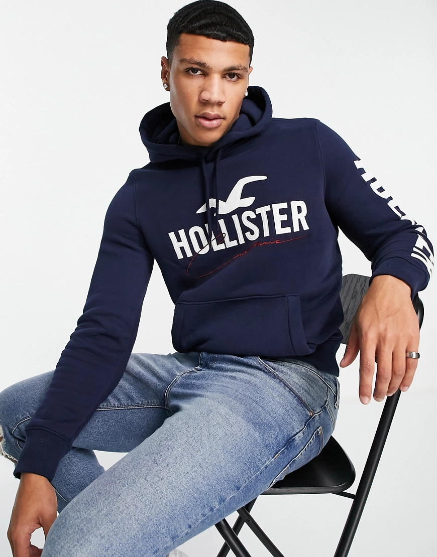 Hollister – Funktions-Kapuzenpullover in Marineblau mit Ärmellogo günstig online kaufen