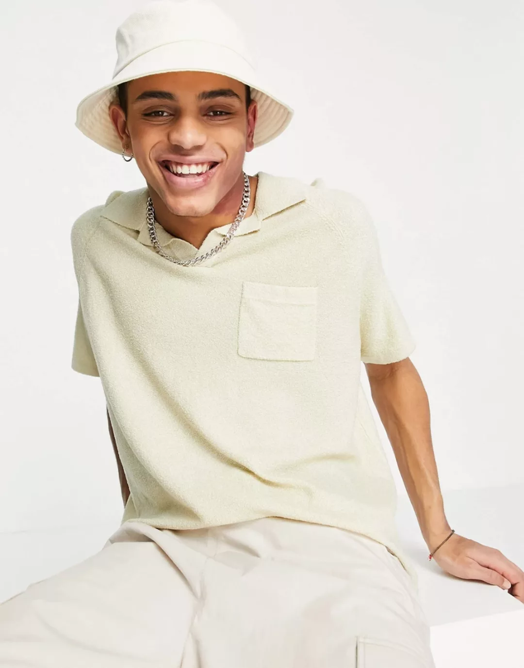 ASOS DESIGN – Oversize-Polohemd aus strukturiertem Garn in Putty-Gelb-Neutr günstig online kaufen