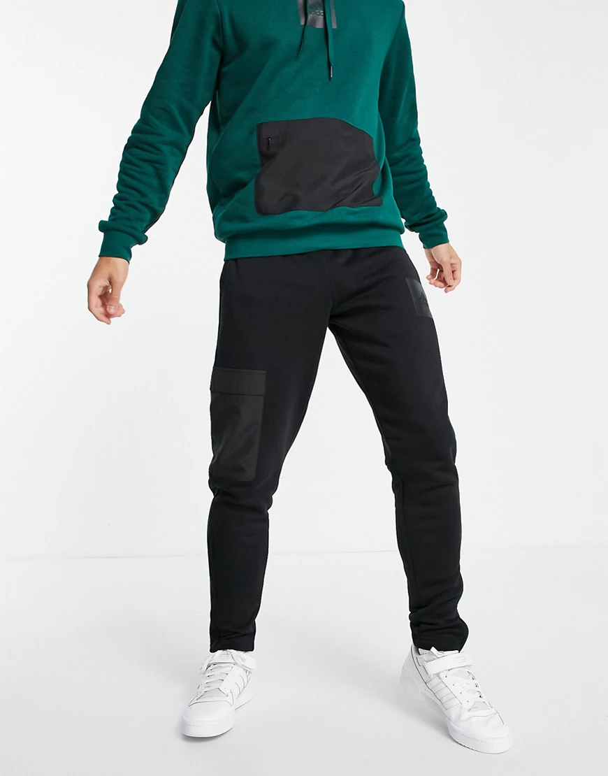 adidas – Fleece-Jogginghose in Schwarz günstig online kaufen