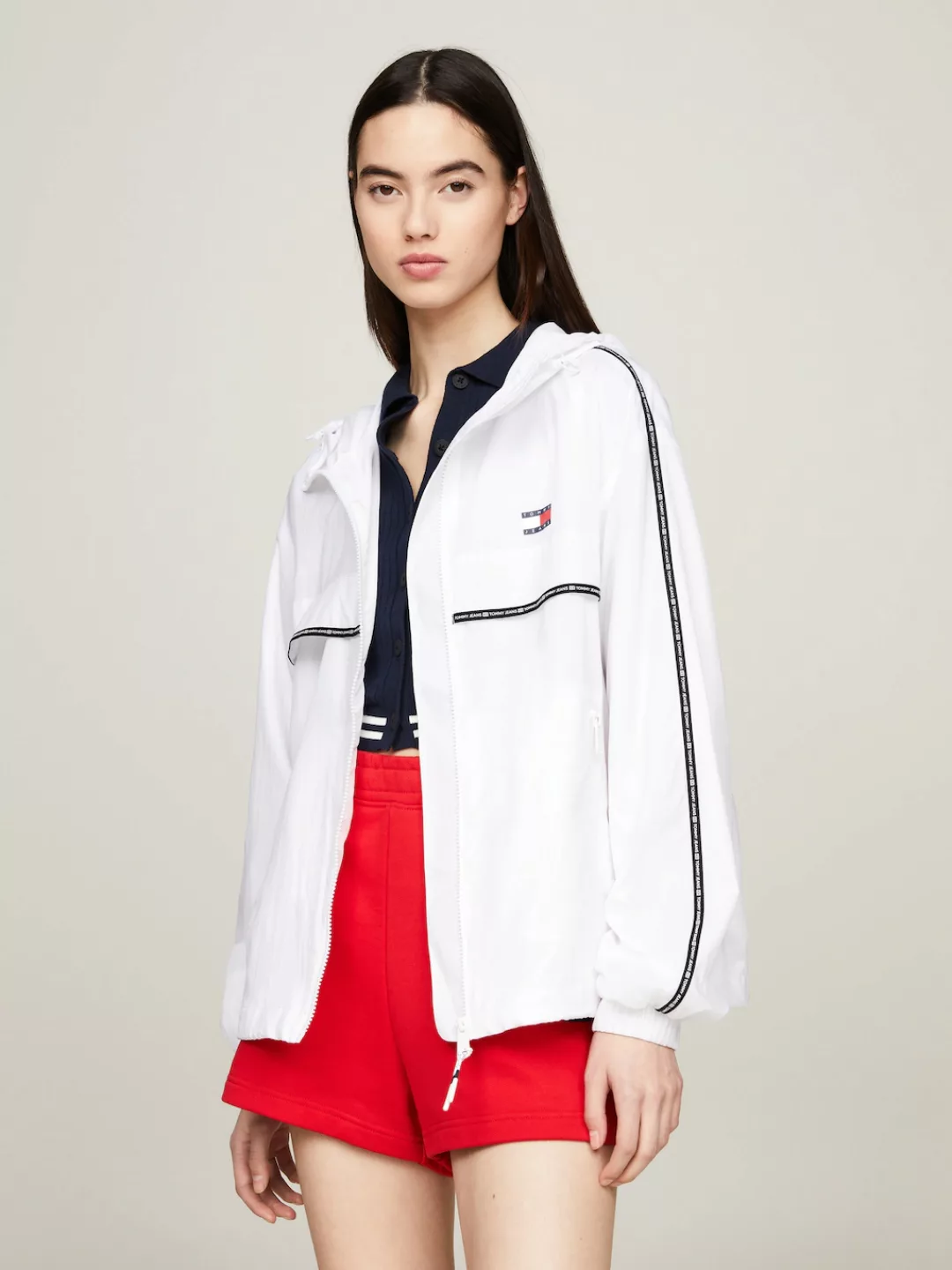 Tommy Jeans Windbreaker "TJW CHICAGO TAPE WINDBREAKER EXT", mit Kapuze, mit günstig online kaufen