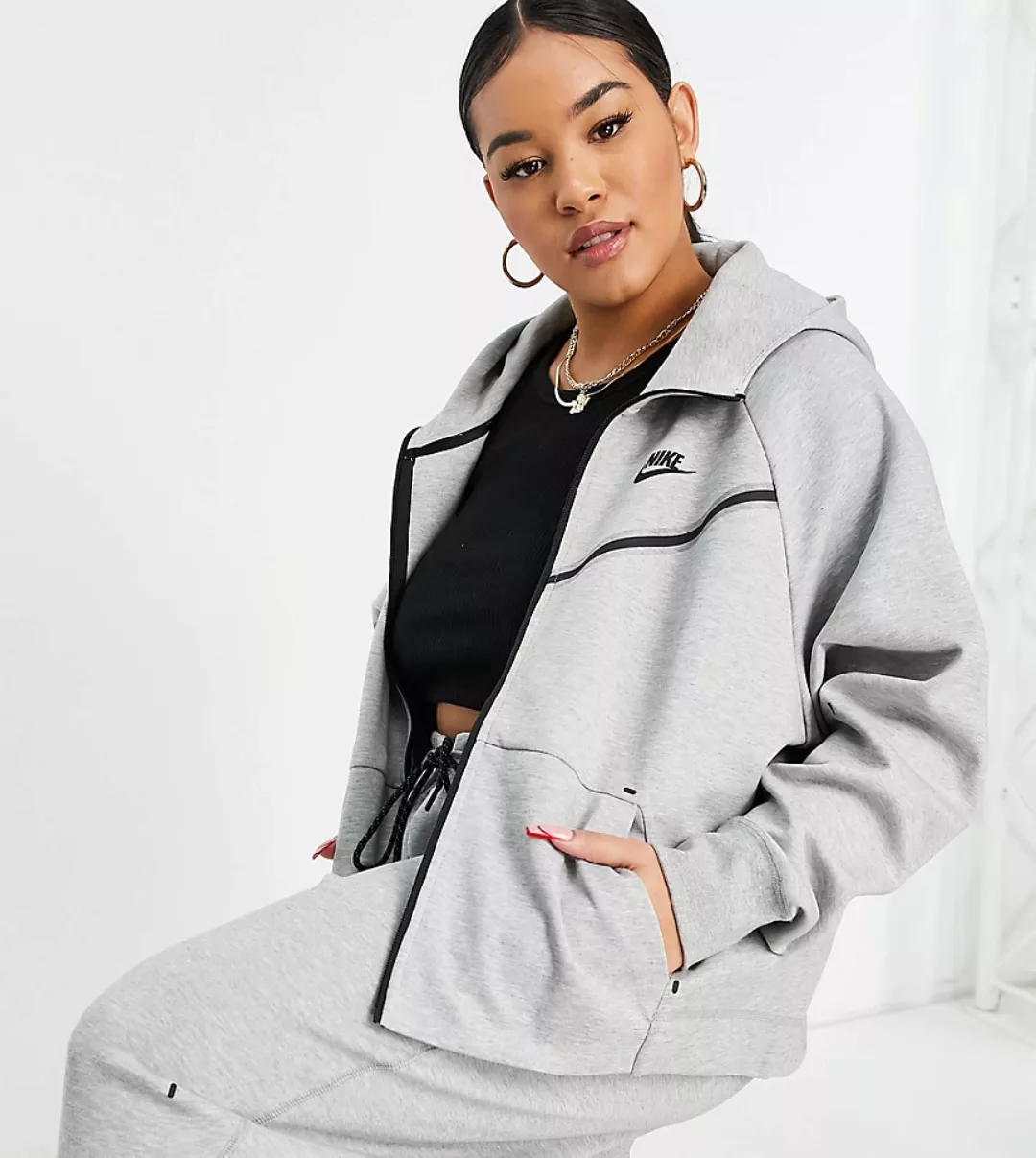 Nike Plus – Tech – Fleece-Kapuzenjacke in Grau-Rosa günstig online kaufen