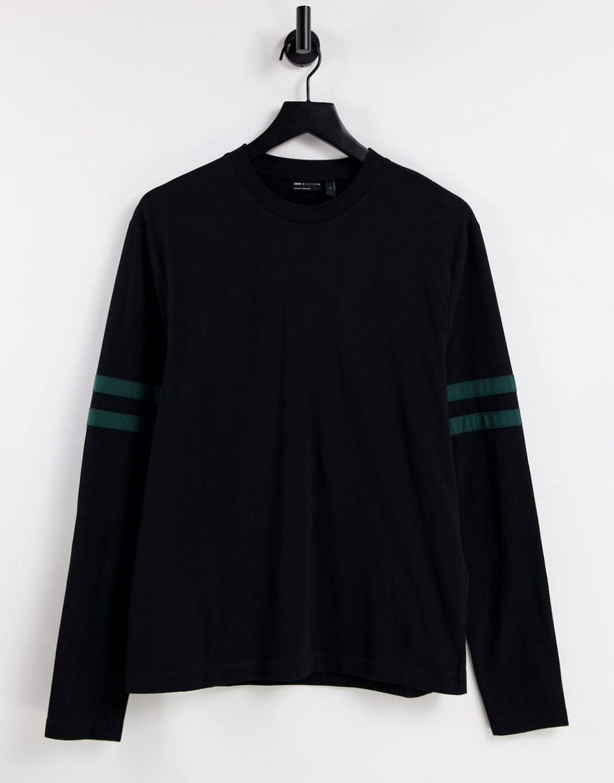 ASOS DESIGN – Langärmliges Shirt aus Bio-Baumwolle in Schwarz mit Kontrasts günstig online kaufen