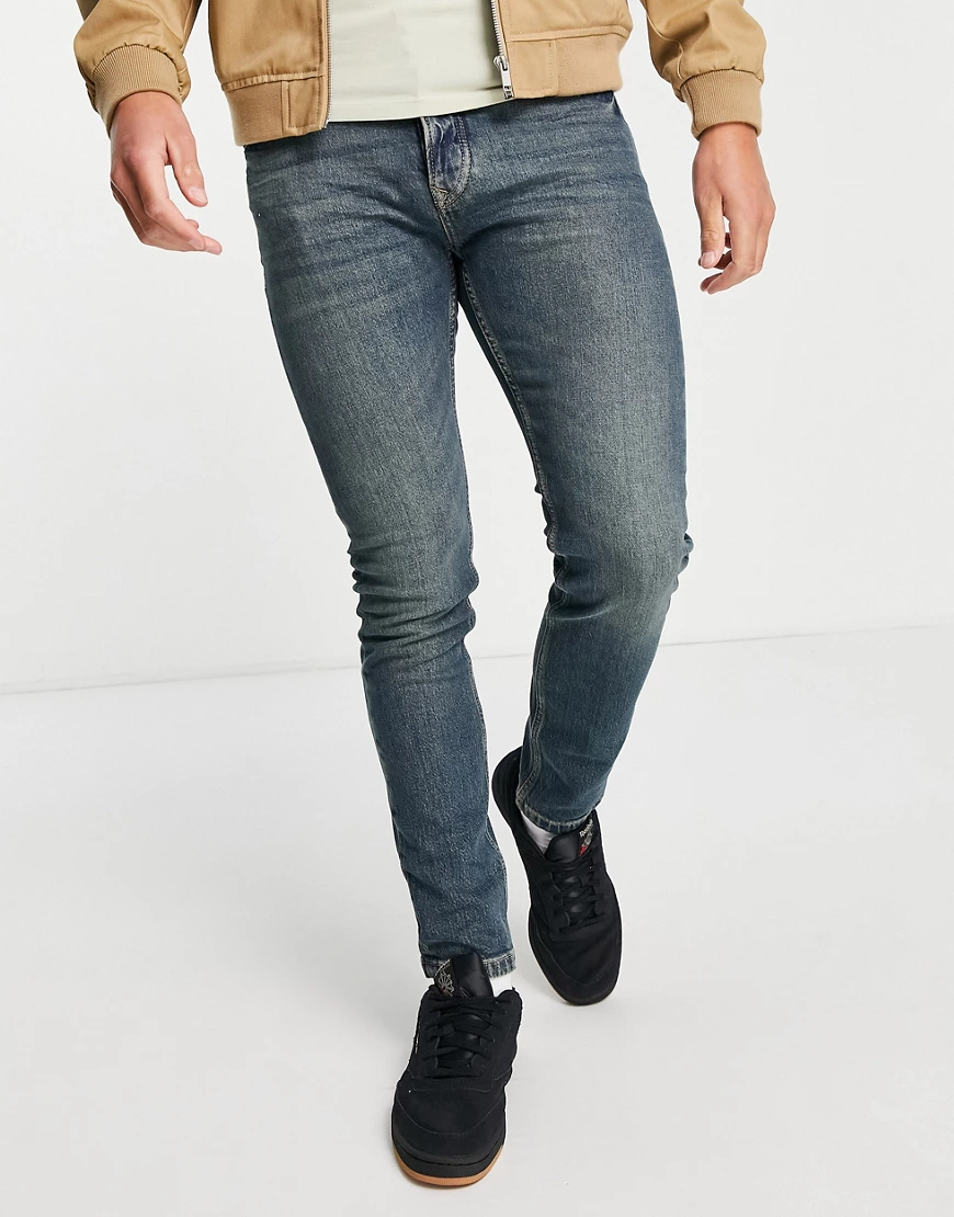 Topman – Eng geschnittene Jeans mit Stretchanteil in Patinagrün in mittlere günstig online kaufen
